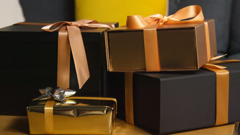 Close-Up-Of-Gift-Wrapped-Presents-On-Table-In-Lounge-At-Home-1